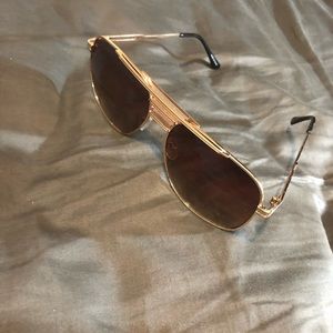 Brown and gold sunglasses